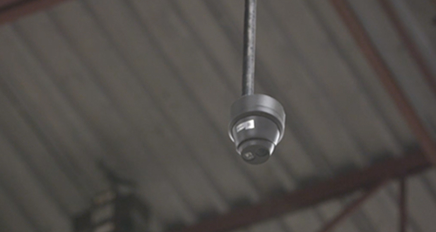 Security Camera hanging from ceiling